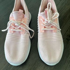 Pink mesh tennis shoes